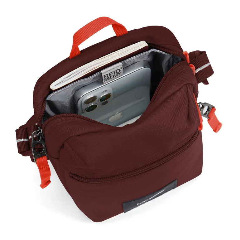 Pacsafe GO Micro Sac bandoulière antivol - Garnet Red
