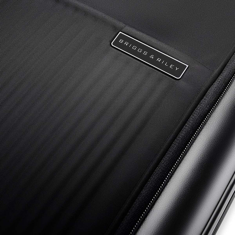 Briggs & Riley Sympatico Essential 22" Valise à main extensible à roulettes avec poche avant