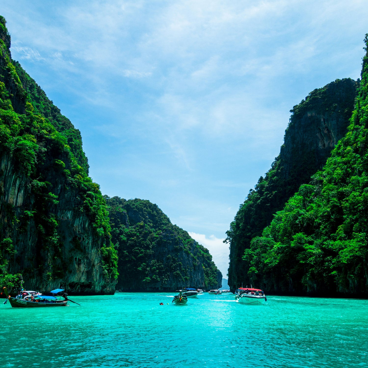 Photo by <a href="https://unsplash.com/@mike_swigunski?utm_source=unsplash&utm_medium=referral&utm_content=creditCopyText">Mike Swigunski</a> on <a href="https://unsplash.com/photos/boats-on-sea-near-mountain-during-daytime-Of_u2aPwugw?utm_source=unsplash&utm_medium=referral&utm_content=creditCopyText">Unsplash</a>
      