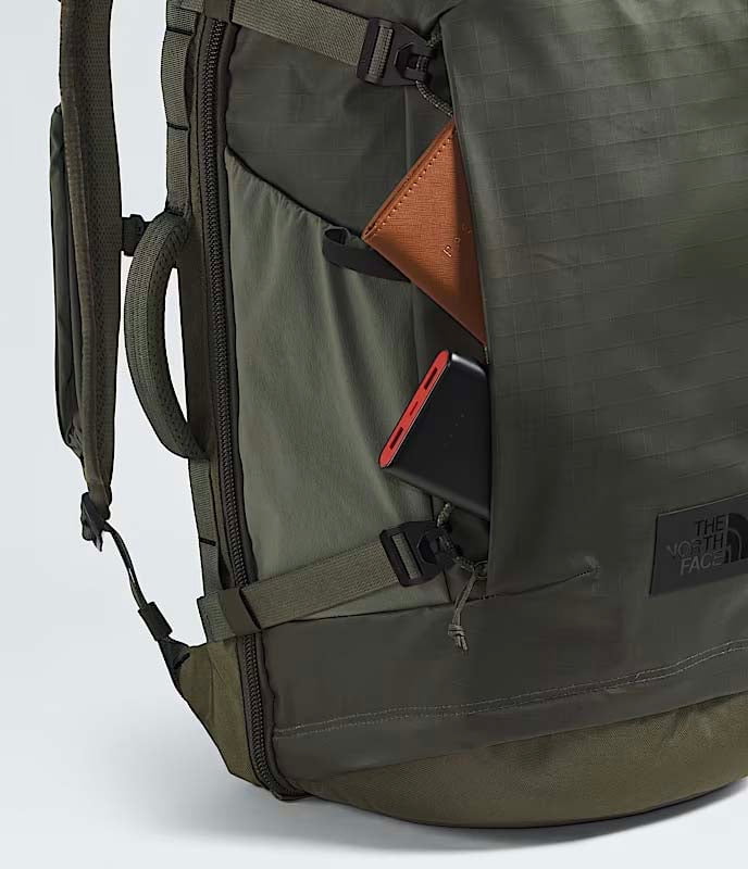 The North Face Backpacks New Taupe Green/TNF Black The North Face Base Camp Voyager Pro Travel Pack - New Taupe Green/TNF Black