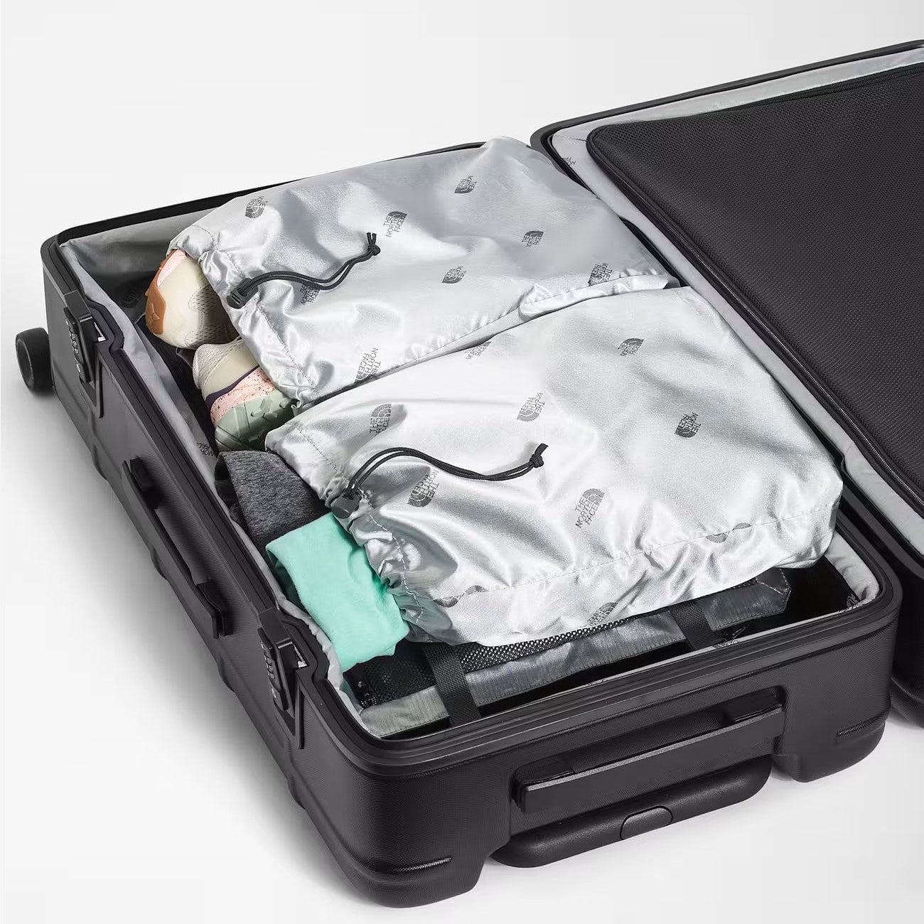 The North Face Luggage TNF Black/TNF White-NPF The North Face All Weather 4-Wheeler—30" Large Luggage
